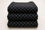 Checkerboard Knit — Folded stack view