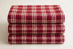 Cranberry Plaid Cotton — Folded stack view