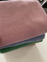 Waved urban rib knit fabric by the yard - dusty rose and denim blue ribbed knit close-up
