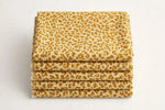 Golden Savanna Animal Print Canvas — Folded stack view