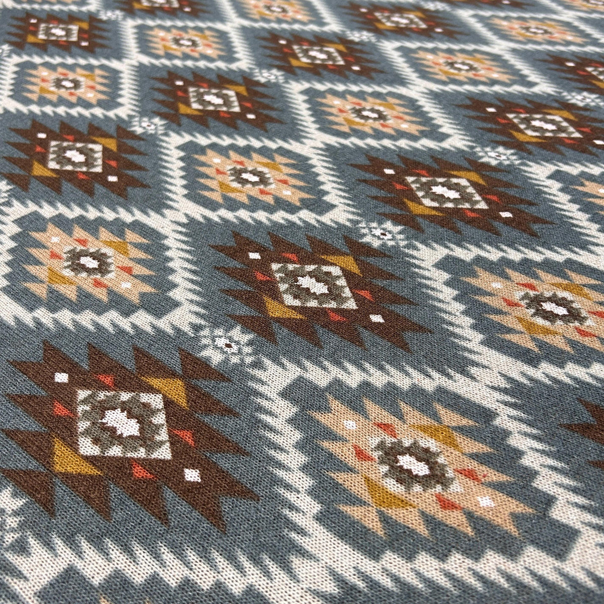 Southwestern aztec tapestry fabric close-up texture detail