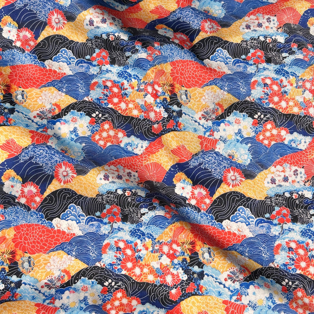 Red and blue kimono print fabric close-up texture detail