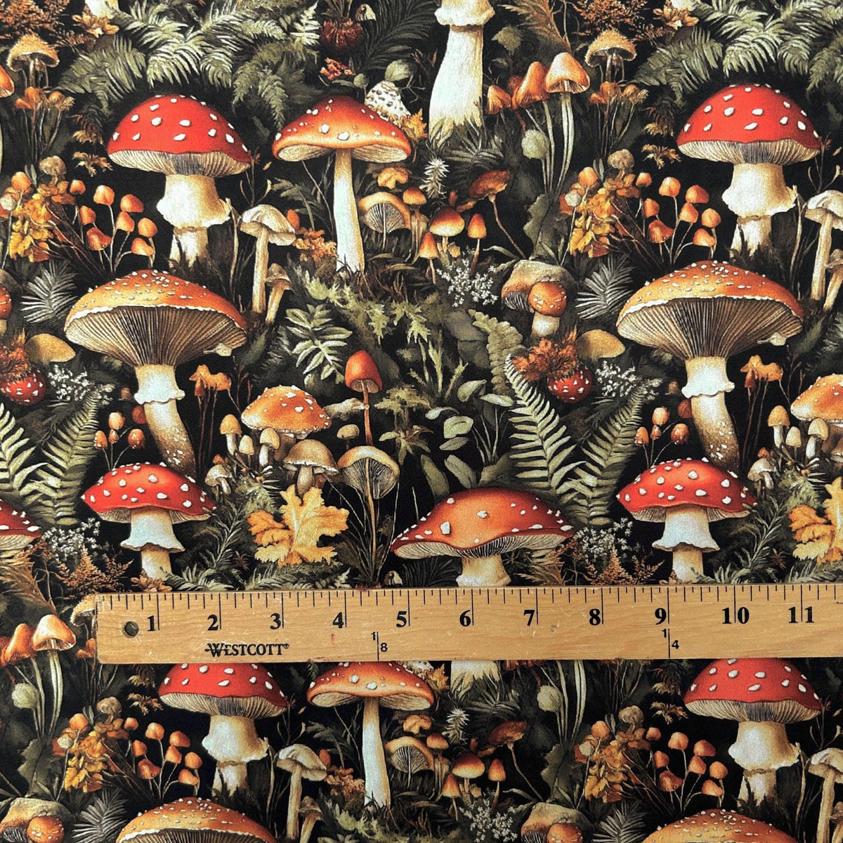 Dark moody mushroom forest fabric folded view