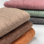 Brown cable twist knit fabric