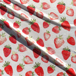 Watercolor strawberry fabric flat lay view