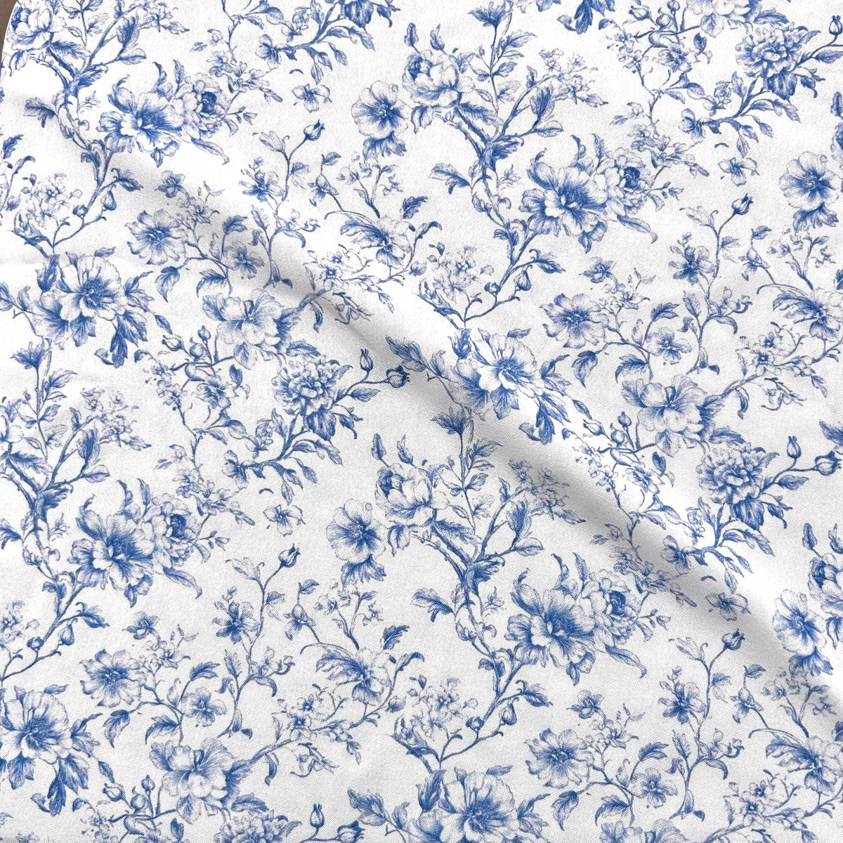 Blue french toile fabric draped view