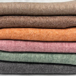 Brown cable twist knit fabric close-up texture detail