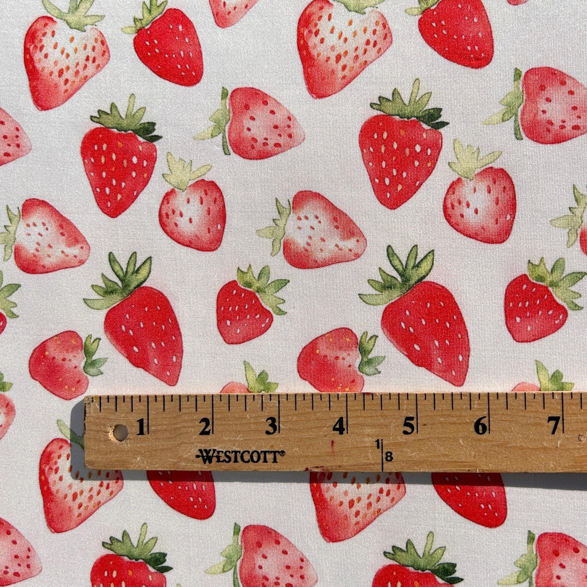 Watercolor strawberry fabric detail view