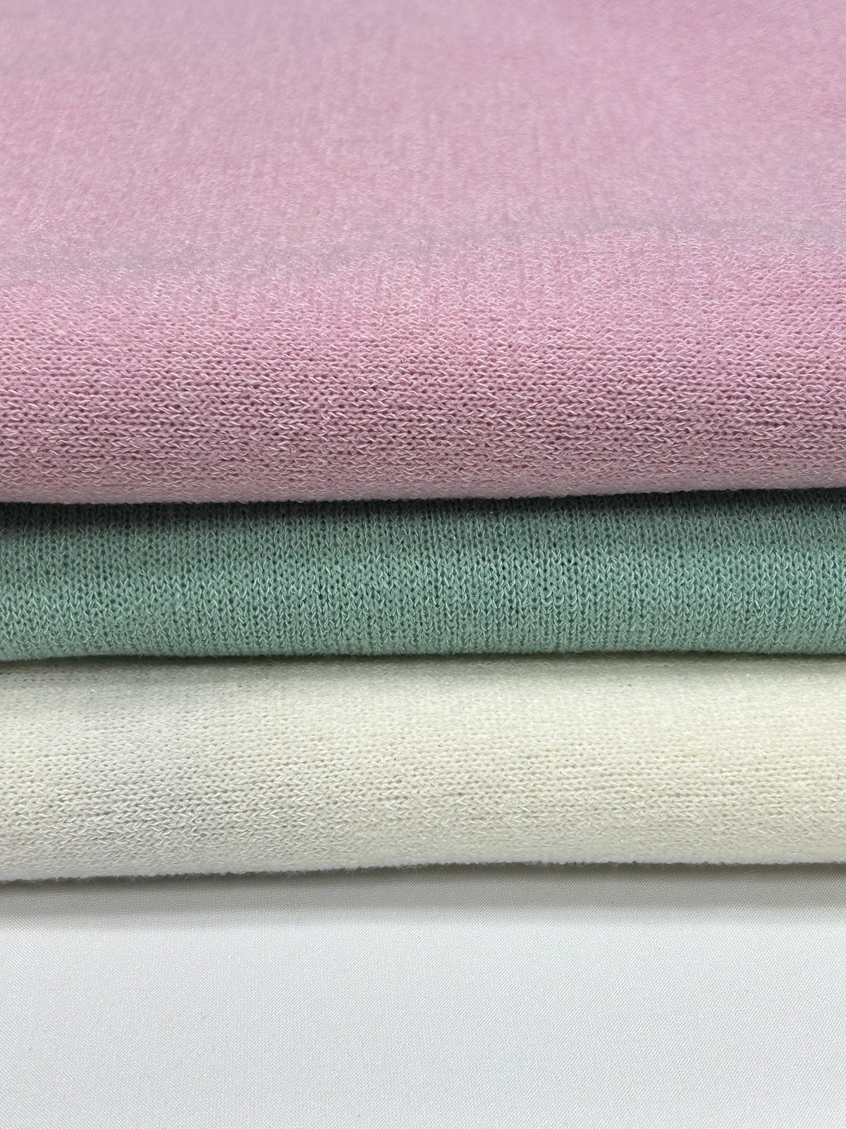Mirr pastel sweater knit fabric close-up texture detail