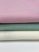 Mirr pastel sweater knit fabric close-up texture detail