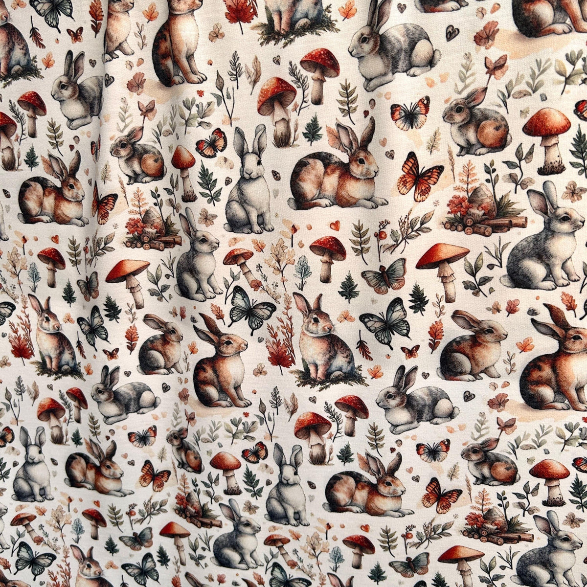 Medieval woodland bunny fabric flat lay view