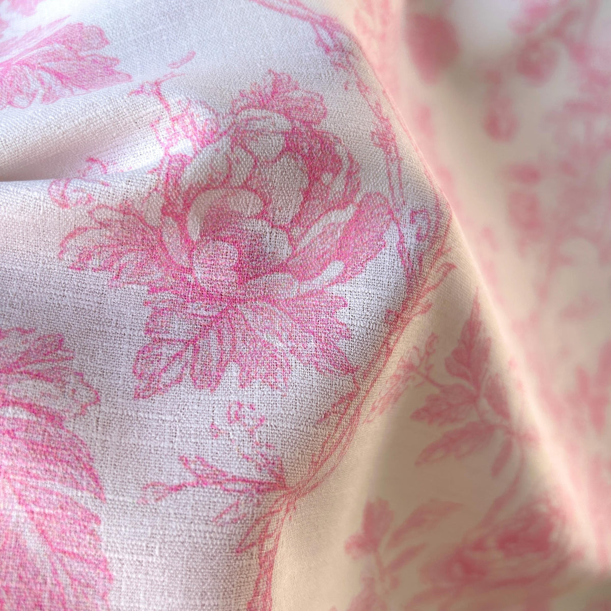 Pink premier prints toile fabric close-up texture detail