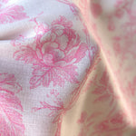 Pink premier prints toile fabric close-up texture detail