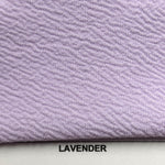 Liverpool textured knit fabric draped view