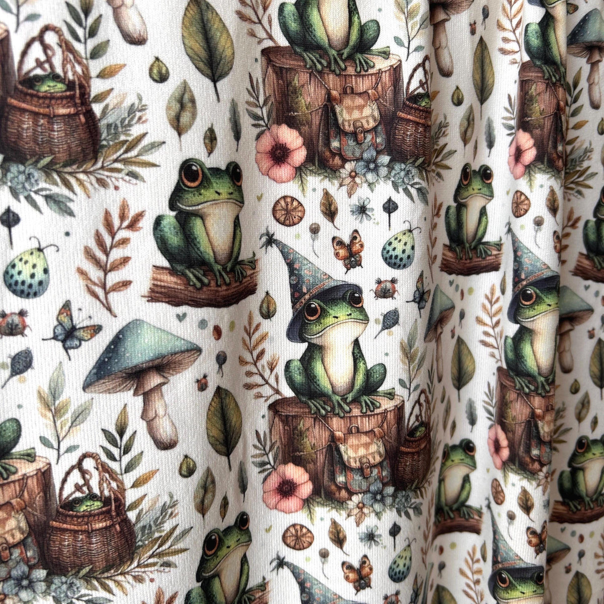 Whimsical frog woodland fabric flat lay view
