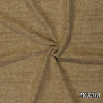Brown cable twist knit fabric detail view