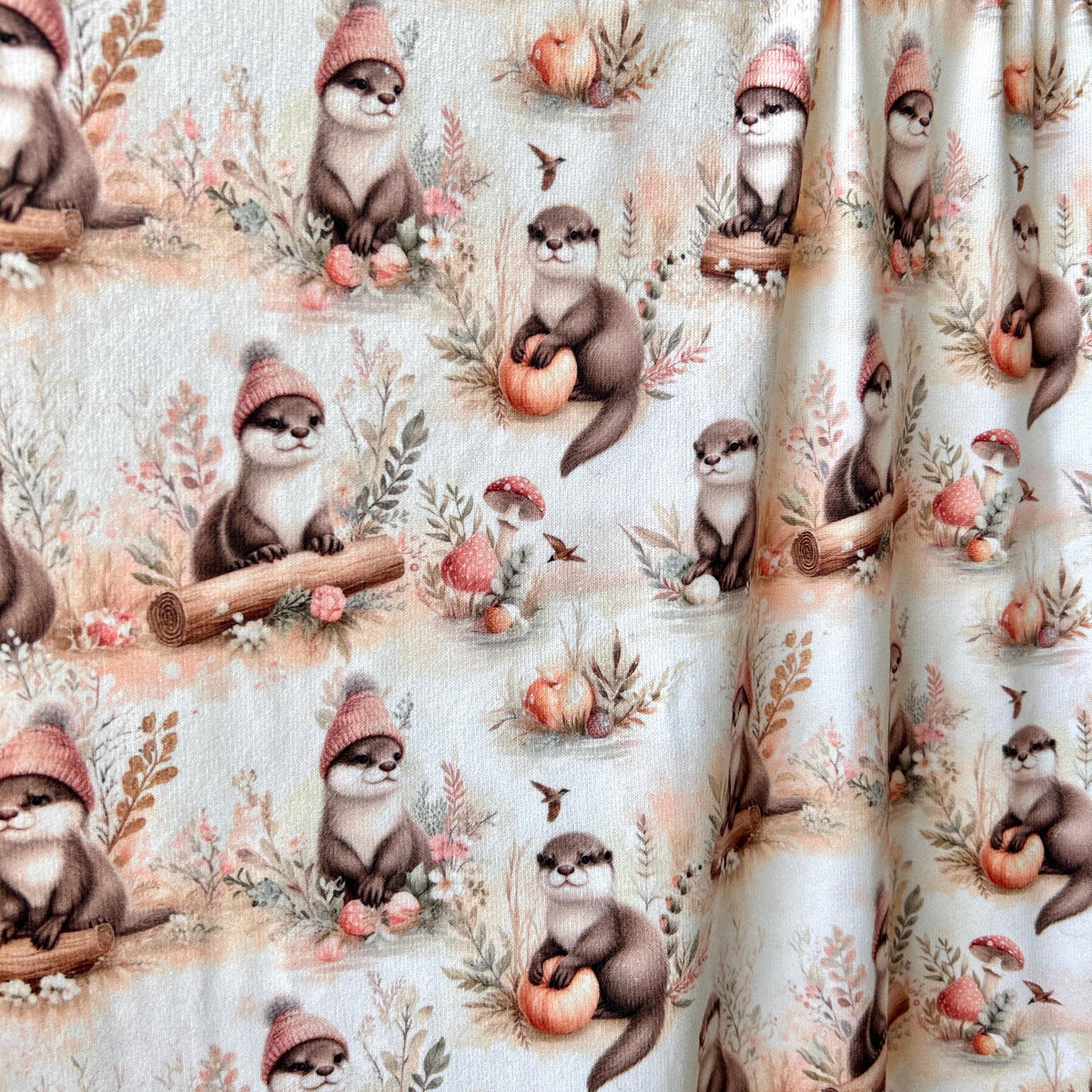 Otter woodland animal fabric flat lay view