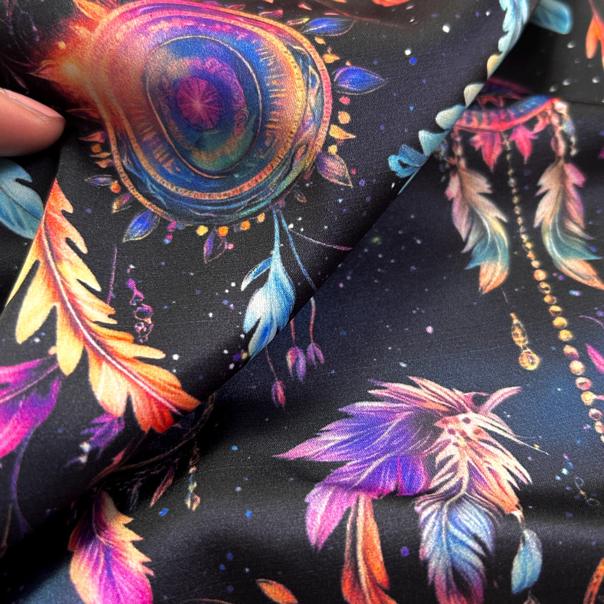 Dark night dreamcatcher galaxy fabric flat lay view