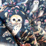 Moon garden owl floral satin fabric flat lay view