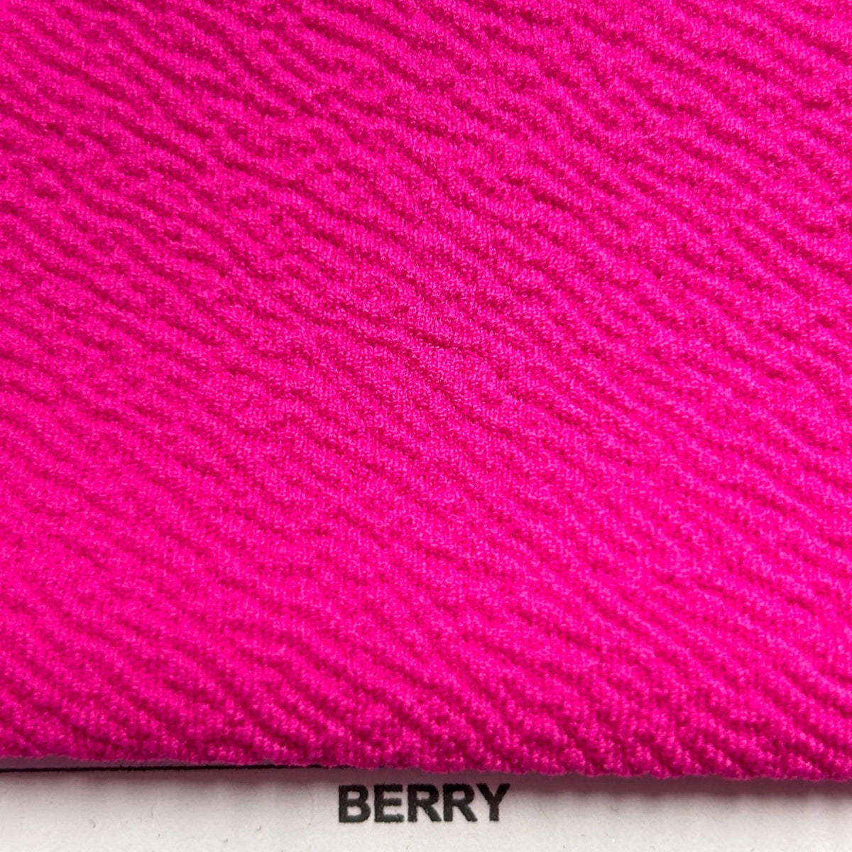 Tula pink liverpool knit fabric flat lay view