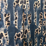 Animal mix denim print fabric close-up texture detail