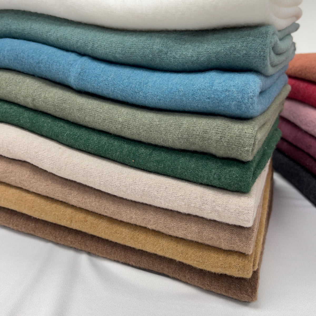 Cashmere blend sweater knit fabric draped view
