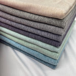 Tri-blend jersey knit fabric flat lay view