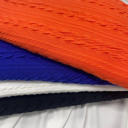 Twisted cable knit fabric