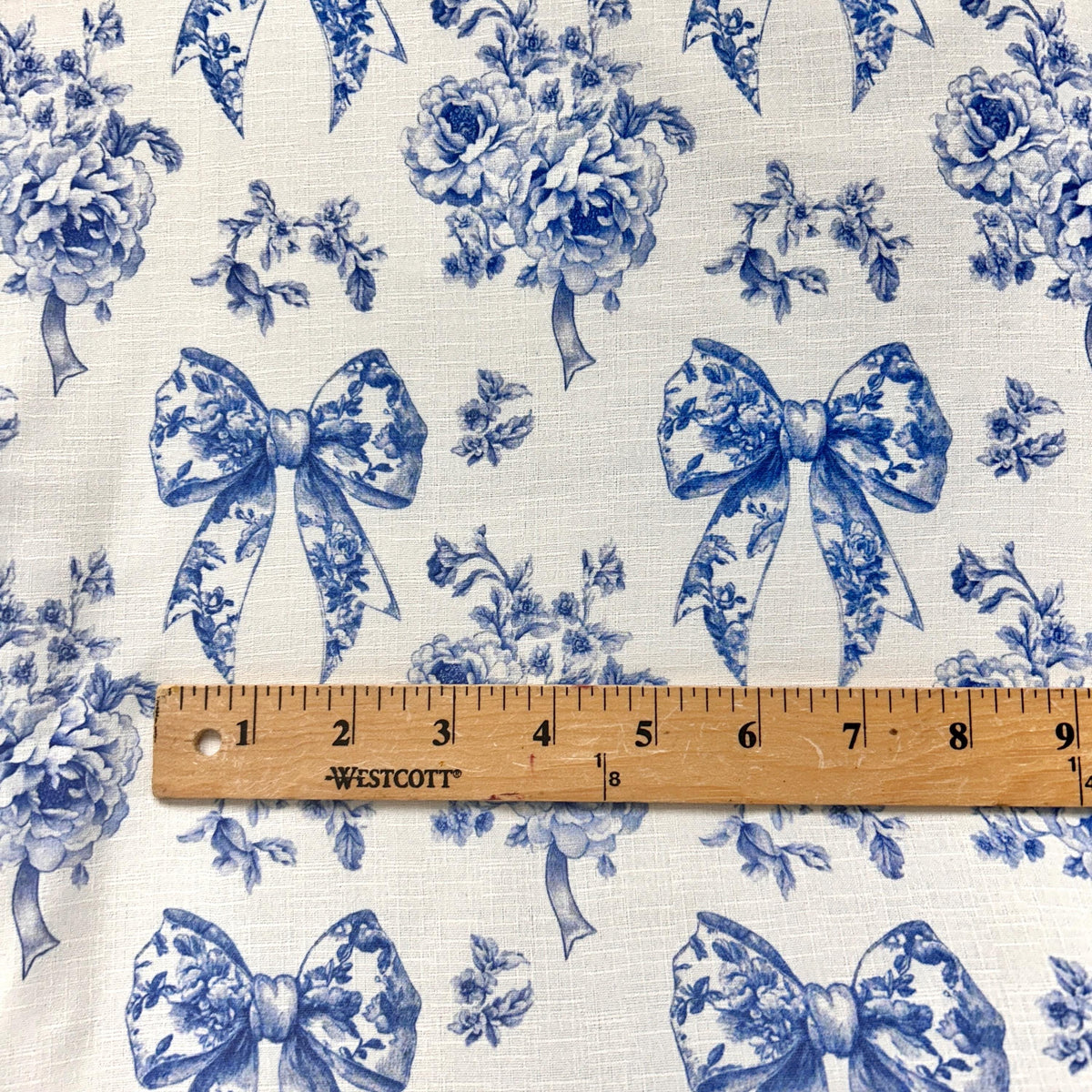 French blue ribbon toile fabric texture close-up