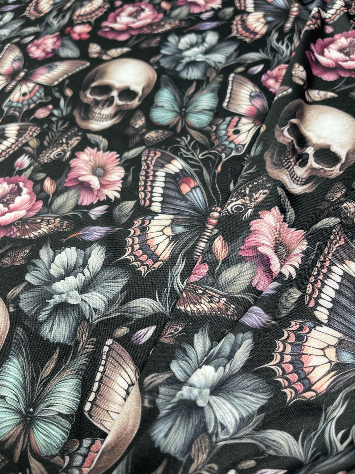 Floral gothic skull fabric detail view