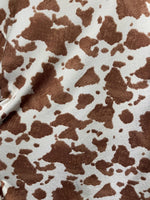 Boho highland cow fabric close-up texture detail