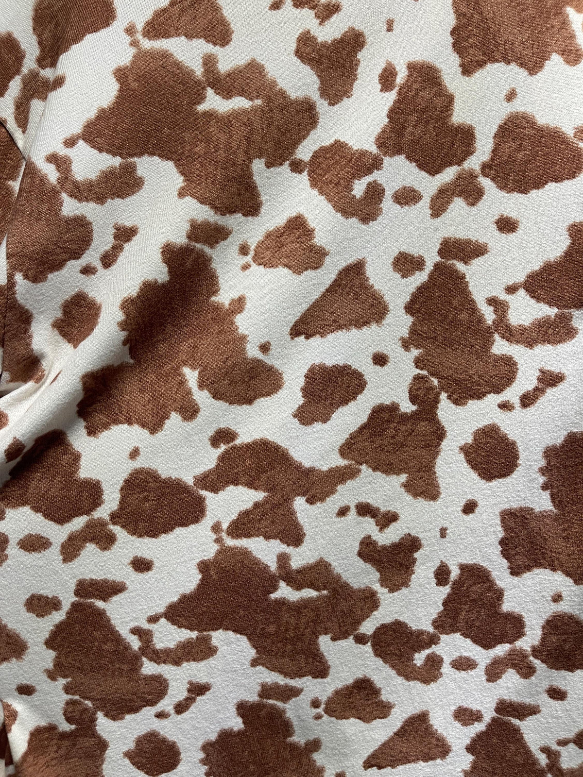 Boho highland cow fabric close-up texture detail