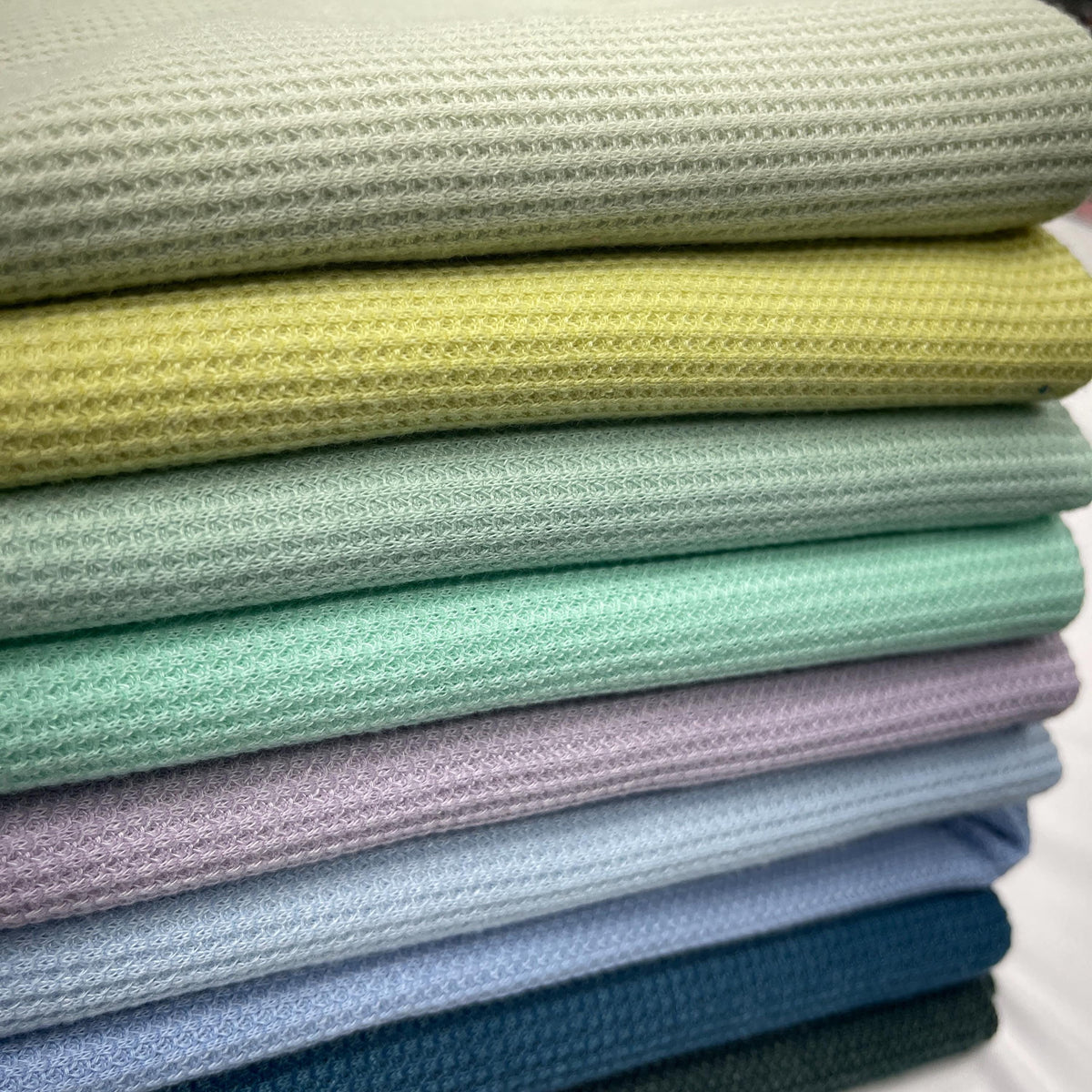 Soft brushed waffle knit fabric close-up texture detail