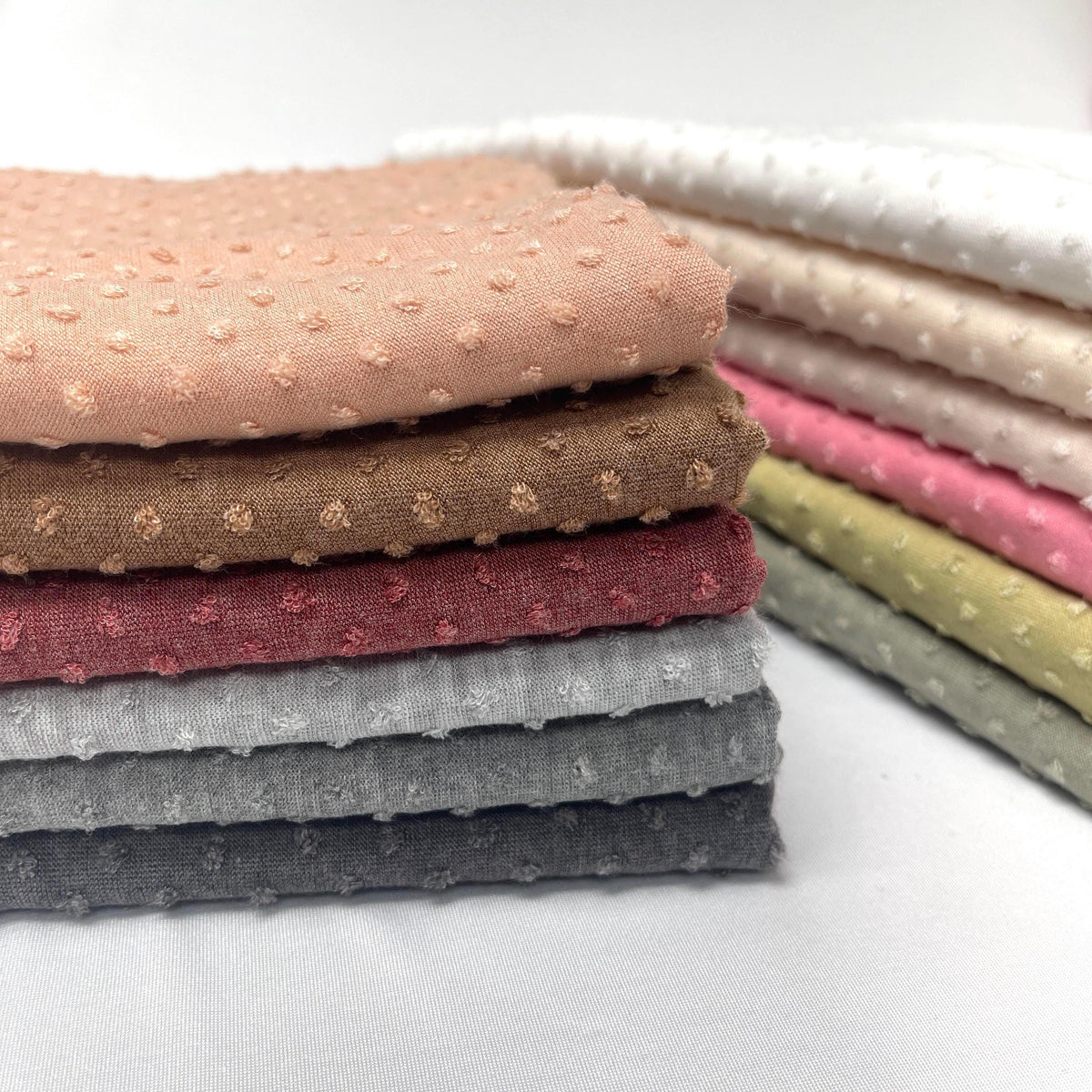 Swiss dot jacquard knit fabric