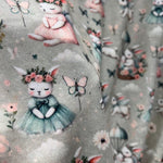 Whimsical bunny fairy nursery fabric flat lay view