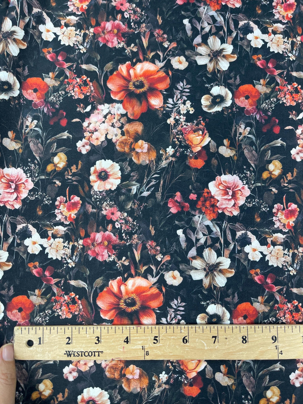 French noir dark floral fabric flat lay view
