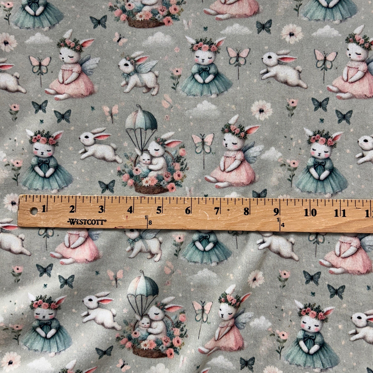 Whimsical bunny fairy nursery fabric draped view