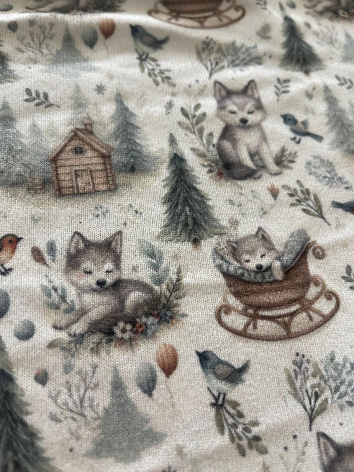 Whimsical woodland fox nursery fabric close-up texture detail