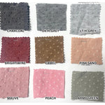 Swiss dot jacquard knit fabric close-up texture detail