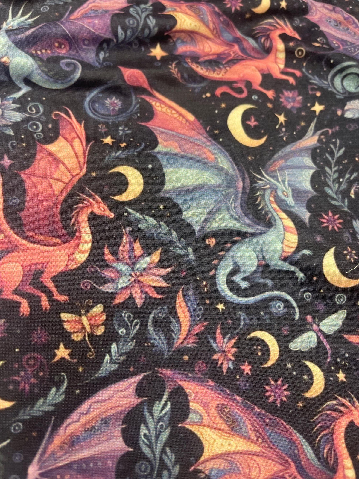 Night dragon safari nursery fabric draped view
