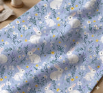 Watercolor bunny nursery fabric close-up texture detail