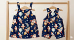 Outer space rocket galaxy nursery fabric draped view