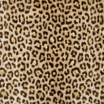 Golden leopard velvet upholstery fabric close-up texture detail