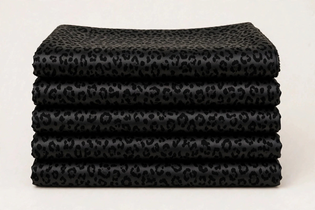 Midnight Prowl Animal Print Satin — Folded stack view