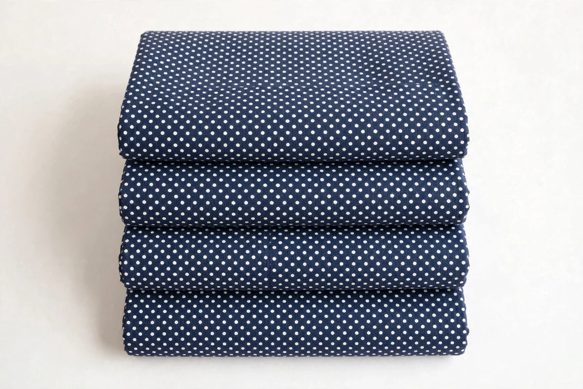Navy Polka Dot Cotton — Folded stack view