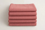 Red Gingham Cotton — Folded stack view