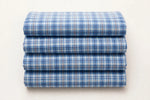 Sky Plaid Cotton — Folded stack view