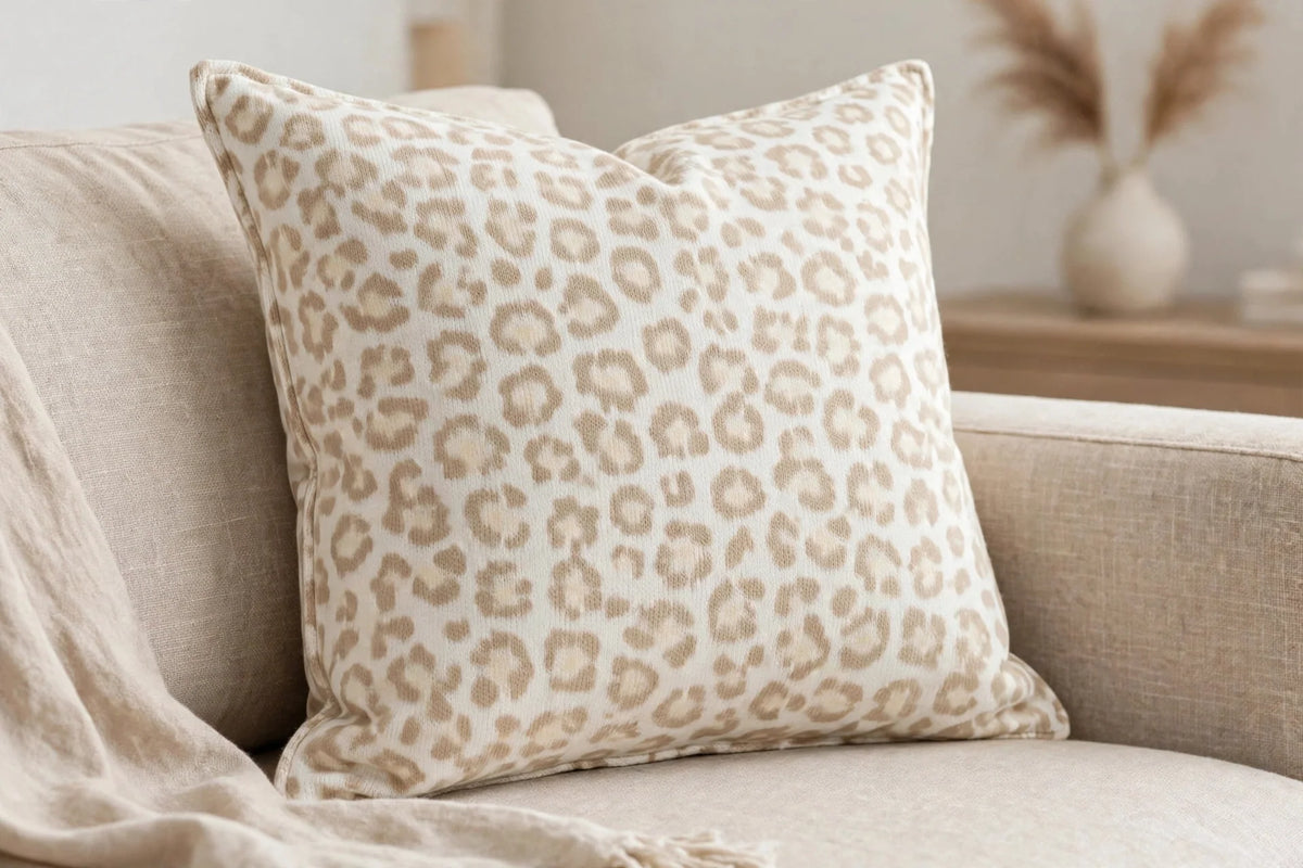 Snow Leopard Jersey Knit — Lifestyle cushion view