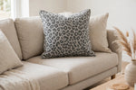 Stone Leopard Knit — Lifestyle cushion view