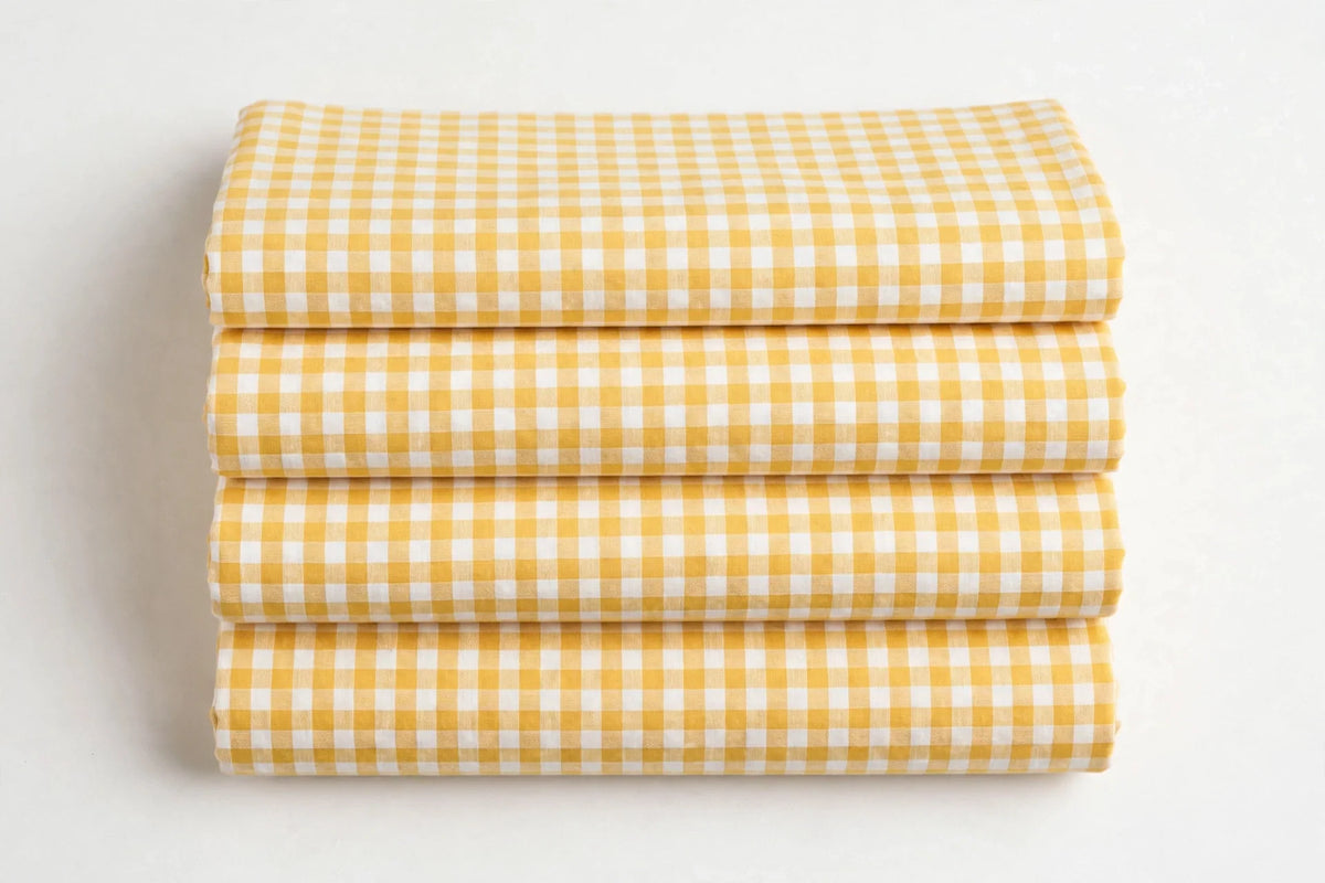 Yellow Gingham Cotton — Folded stack view